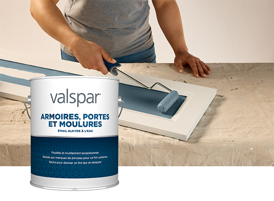 Valspar Cabinet & Furniture Oil-Enriched Enamel container shown during cabinet painting, illustrating a smooth, durable furniture finish.